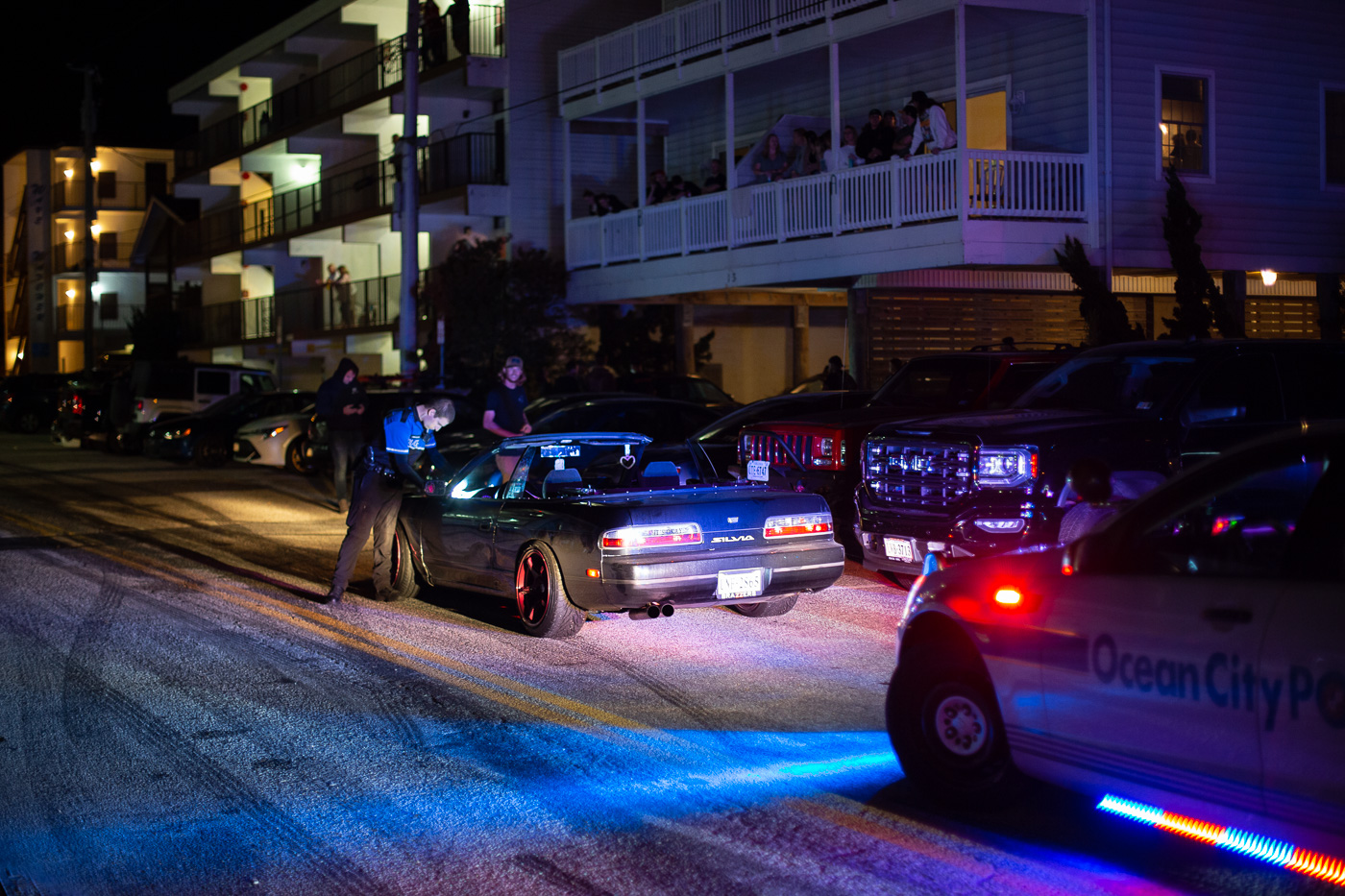 This individual tried to evade police after getting lit up for doing a burnout by throwing the car in reverse. It didn't work out. Nevertheless, hundreds cheered for him from the balconies above as he was arrested.