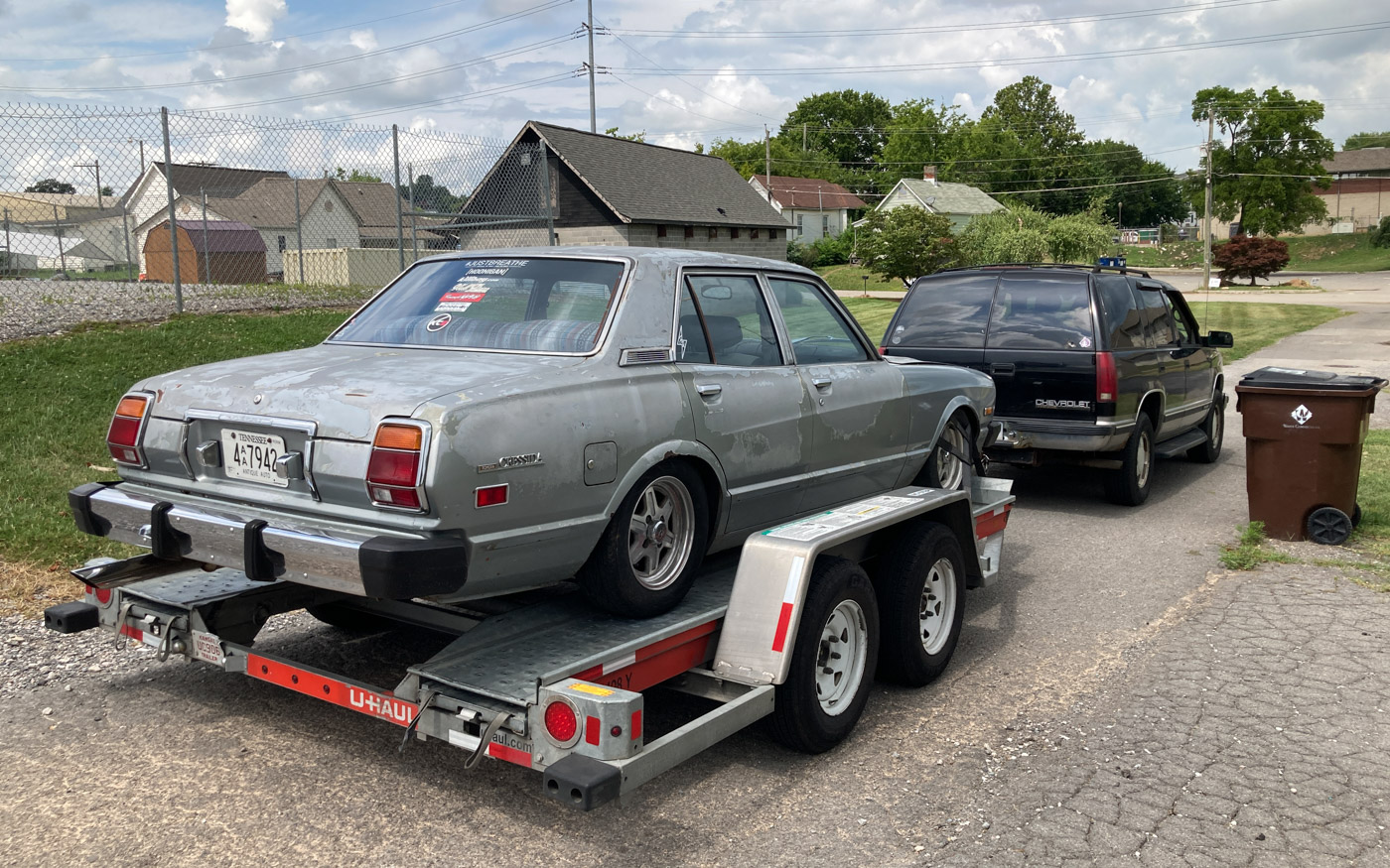 The new MX32 loaded behind Matt's trusty Tahoe. Not 5 minutes before this photo was taken, we were in a light panic as the car was bottomed out on the trailer, not starting, and seemingly dumping coolant. We got it up after I tried to start it as Matt whacked the starter.