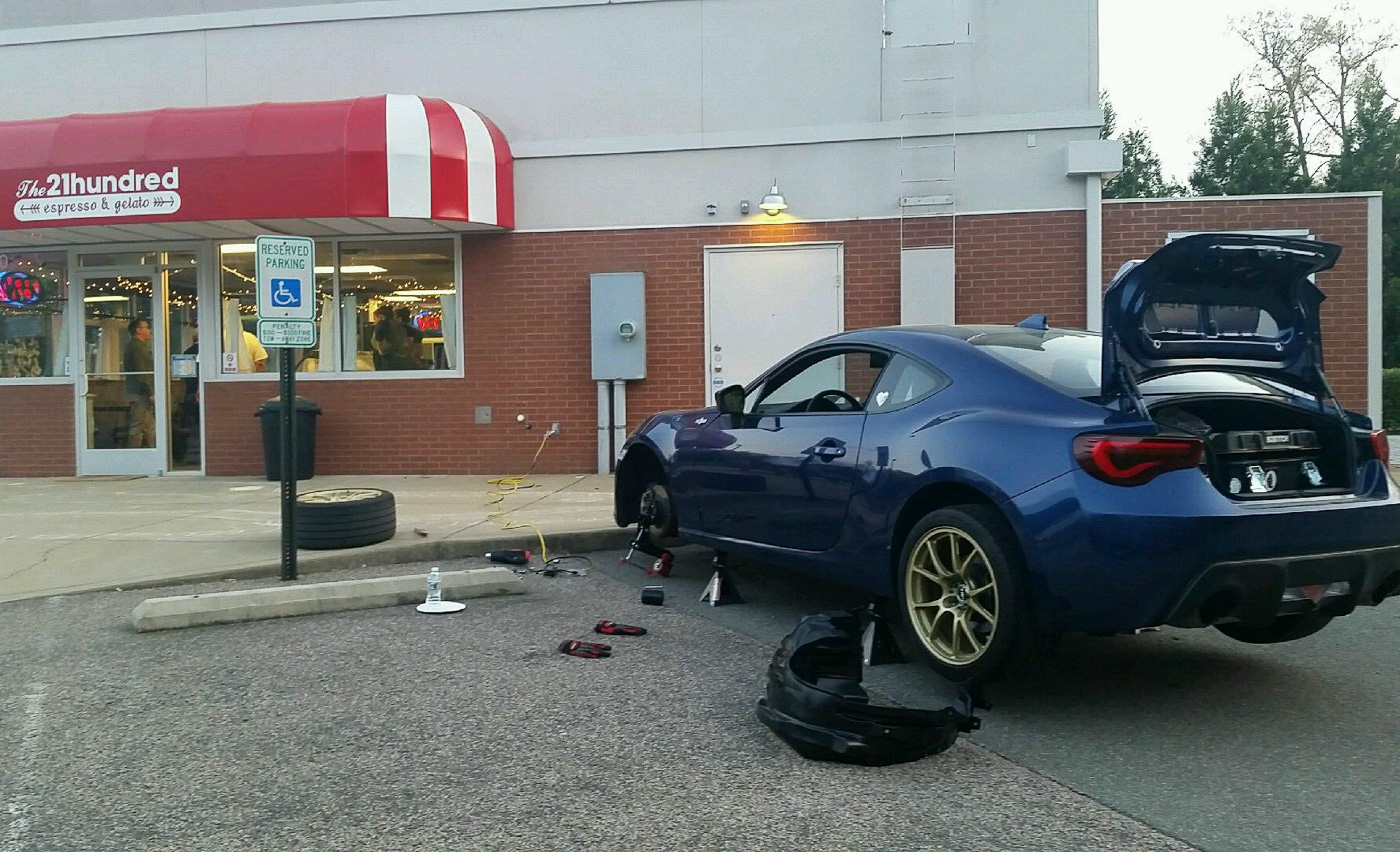 Working on my car wherever there was space - in this case, rolling my fenders. I nailed it on the passenger side but did pretty bad on the driver's side