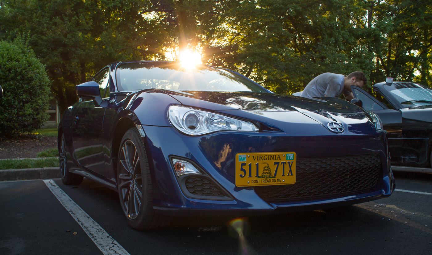 Andrew is in the background working on Suki, an NA Miata he briefly owned