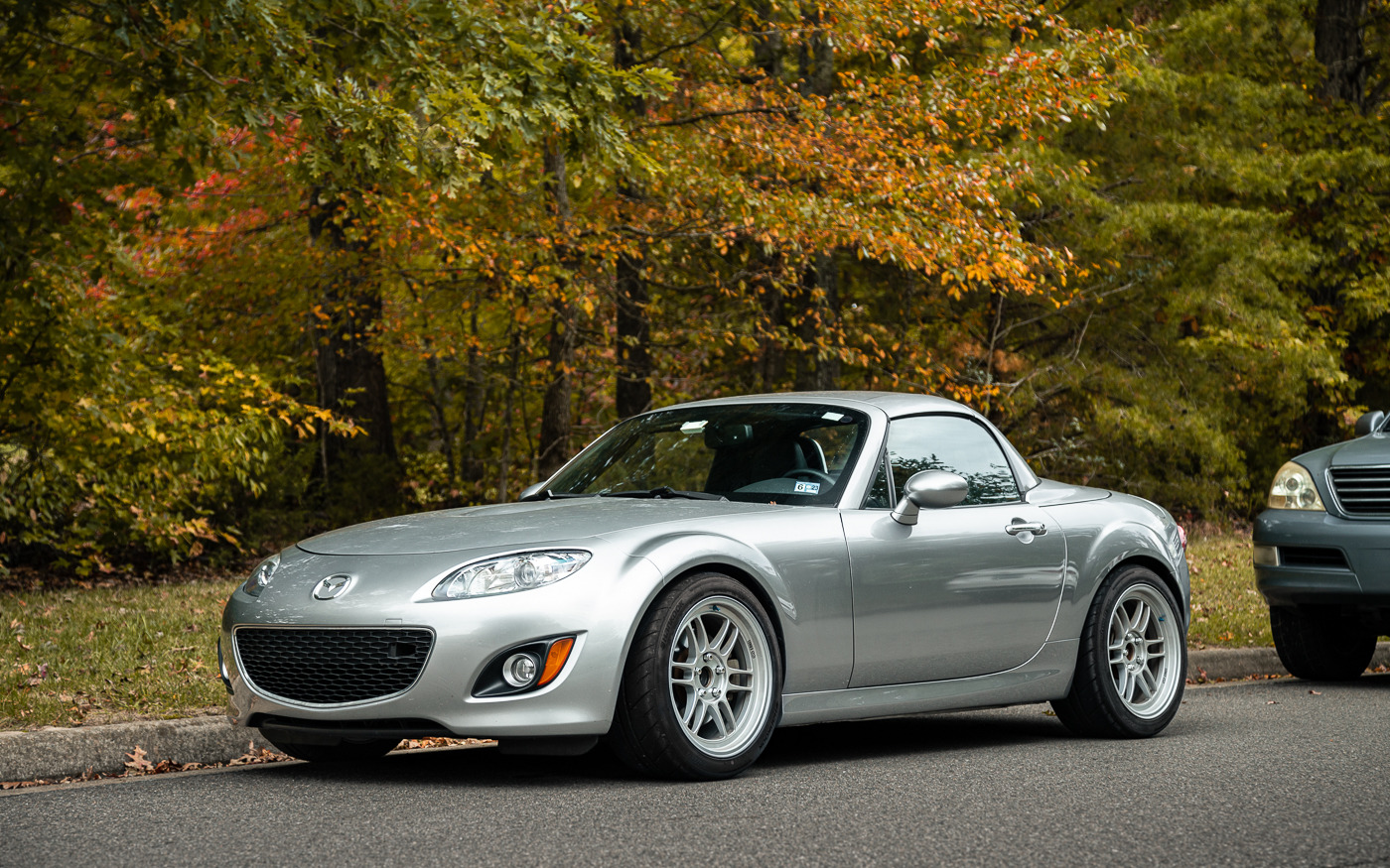 The retractable hard tops on these look a little weird to me, but the meaty wheel and tire setup absolutely slaps